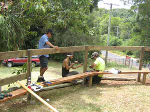 Volunteers building seating at a community working bee